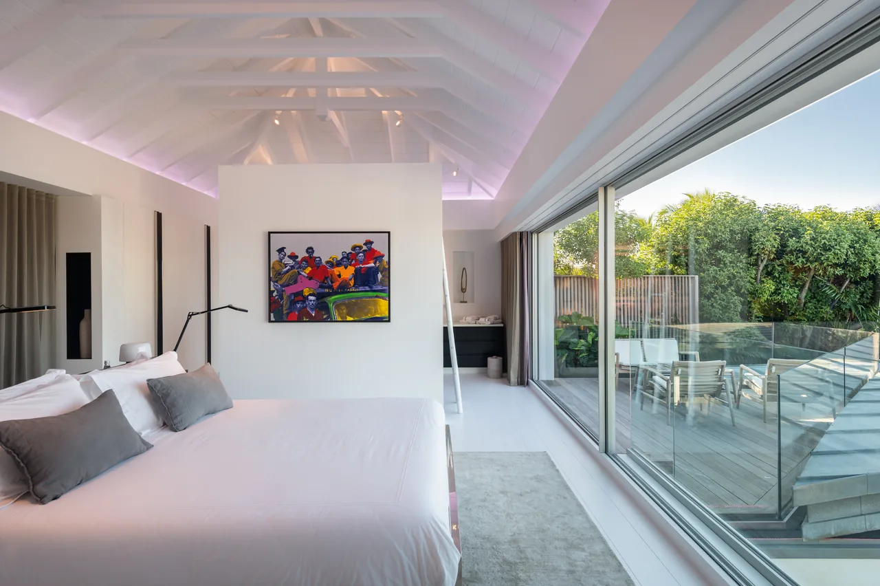 Bedroom 1 — opening onto the deck